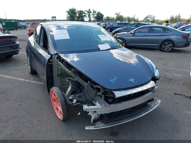 2023 TESLA MODEL Y 7SAYGDEE5PA157920 Photo 0