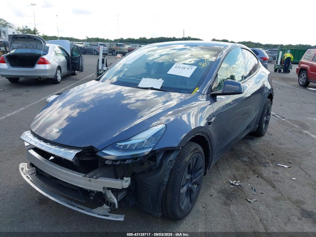 2023 TESLA MODEL Y 7SAYGDEE5PA157920 Photo 1