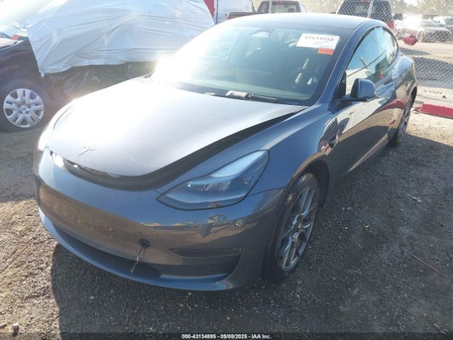 2023 TESLA MODEL 3 5YJ3E1EC4PF675482 Photo 1