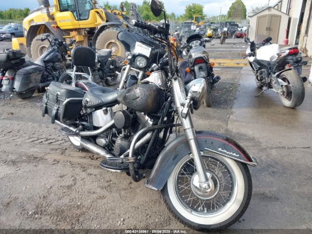 2011 HARLEY-DAVIDSON FLSTC 1HD1BW515BB037151