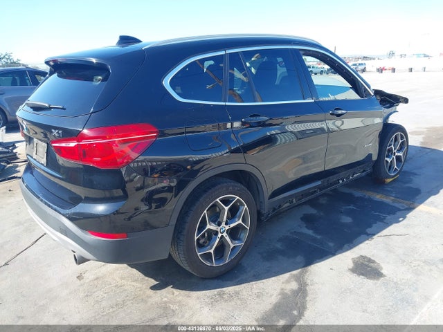 WBXHT3C33J5K22475 BMW X1