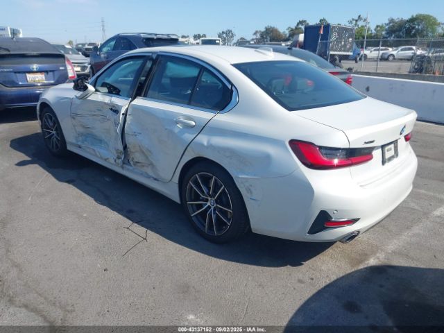2019 BMW 330I WBA5R7C59KAJ79094 Photo 2
