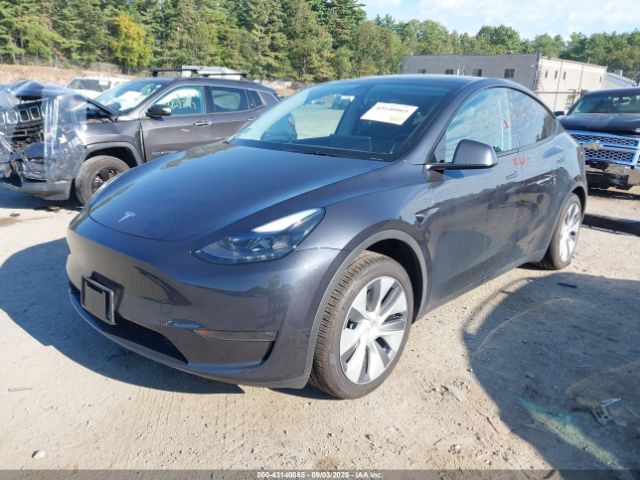 2024 TESLA MODEL Y 7SAYGDEE6RA283917 Photo 1