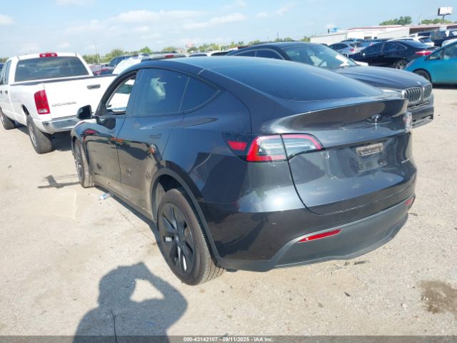 2024 TESLA MODEL Y 7SAYGAEE9RF101399 Photo 2