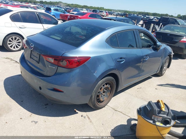 Mazda pe 2014 3MZBM1U72EM101682 Image 4