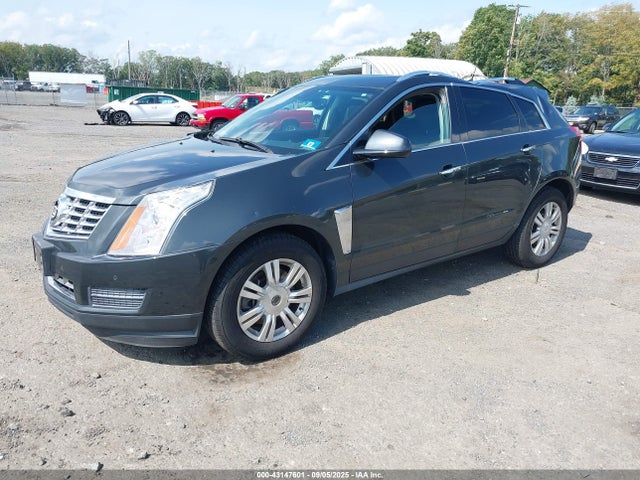 2014 CADILLAC SRX 3GYFNEE35ES661478 Photo 1