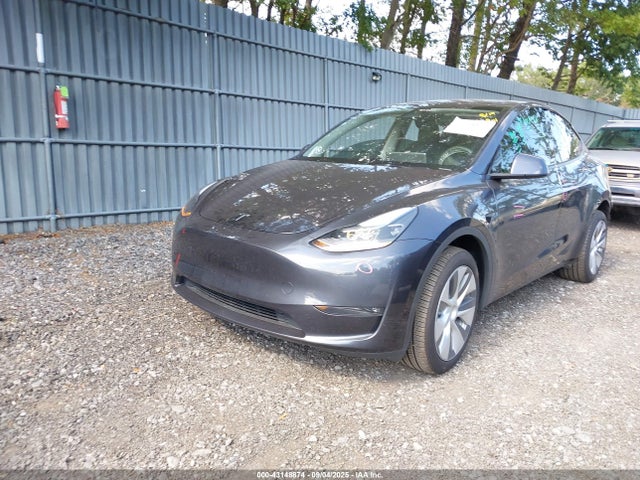 2024 TESLA MODEL Y 7SAYGDEE9RA242536 Photo 1