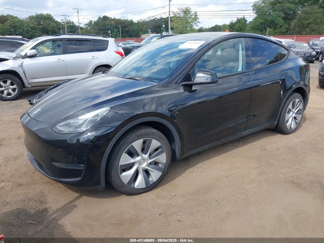 2023 TESLA MODEL Y 7SAYGDEE8PA188062 Photo 1
