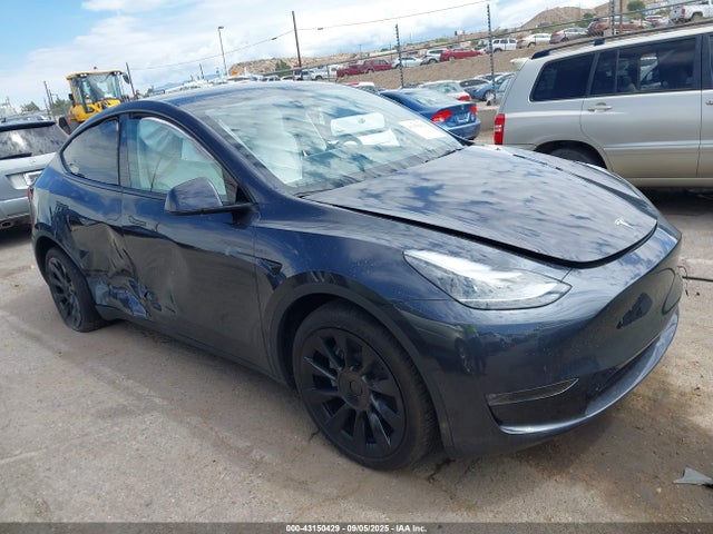 2024 TESLA MODEL Y 7SAYGDEE5RA225345 Photo 0