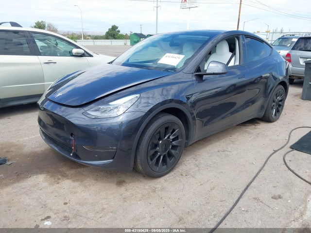 2024 TESLA MODEL Y 7SAYGDEE5RA225345 Photo 1