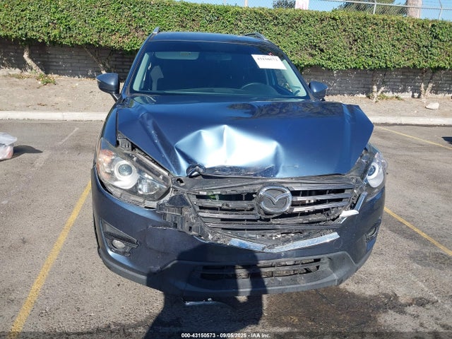JM3KE2CY1G0728404 Mazda py
