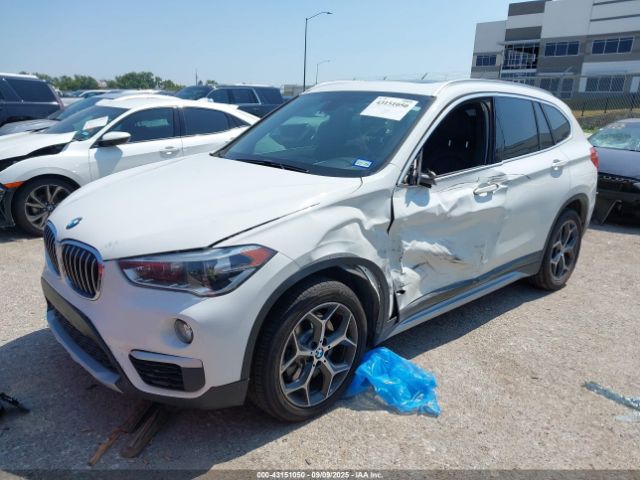 2017 BMW X1 WBXHT3Z38H4A52057 Photo 1