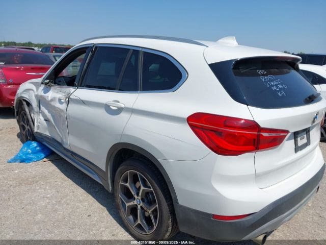 2017 BMW X1 WBXHT3Z38H4A52057 Photo 2