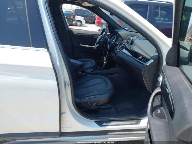 2017 BMW X1 WBXHT3Z38H4A52057 Photo 4