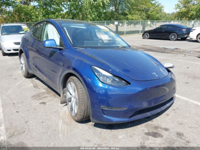 2024 TESLA MODEL Y 7SAYGDEE7RA222799 Photo 0