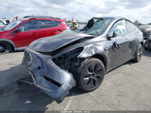 2024 TESLA MODEL Y 7SAYGDED2RF115749 Photo 1