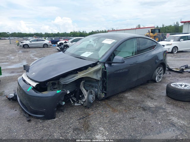 2023 TESLA MODEL Y 7SAYGDEE9PF883931 Photo 1