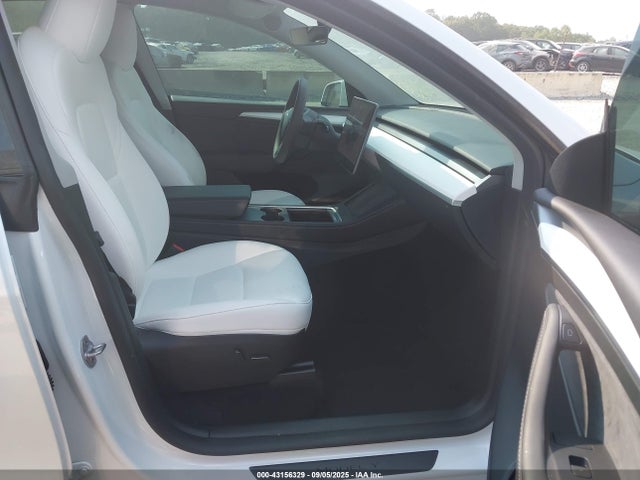 2023 TESLA MODEL Y 7SAYGDEF3PF804018 Photo 4