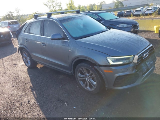 2016 AUDI Q3 WA1GFCFS3GR021660 Photo 0