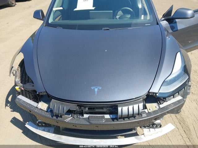 5YJ3E1EB9MF975098 Tesla 2021