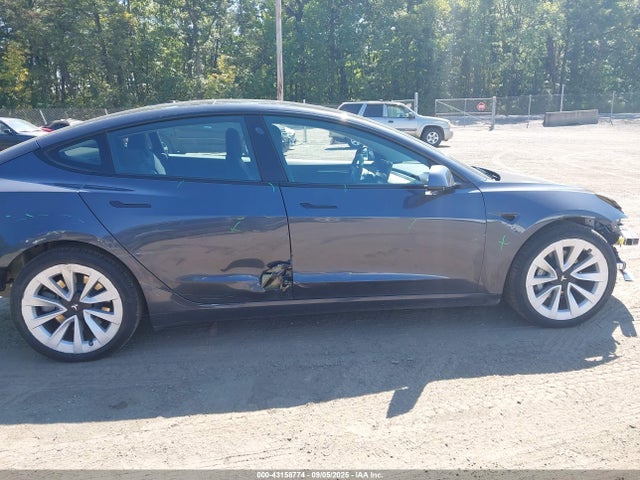 5YJ3E1EB9MF975098 Tesla 2021