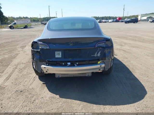 5YJ3E1EB9MF975098 Tesla 2021