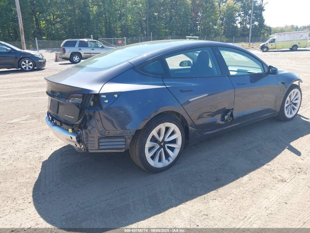 5YJ3E1EB9MF975098 Tesla 2021