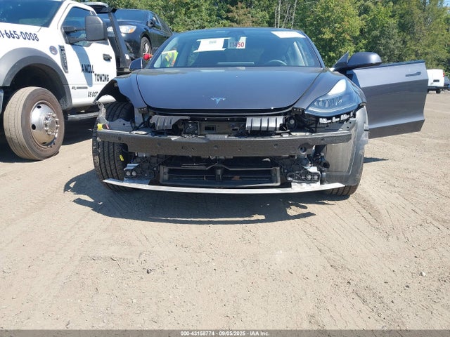 5YJ3E1EB9MF975098 Tesla 2021