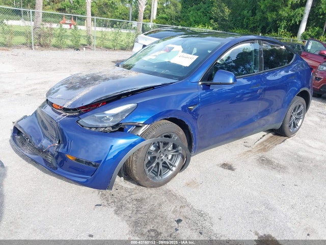 2025 TESLA MODEL Y 7SAYGDED6SF265501 Photo 1