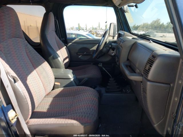 2000 JEEP WRANGLER 1J4FA49S8YP725684 Photo 4