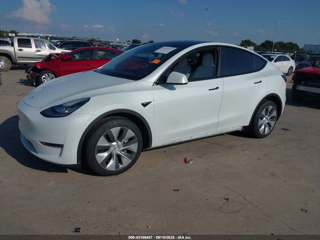 2022 TESLA MODEL Y 7SAYGDEE3NF425220 Photo 1