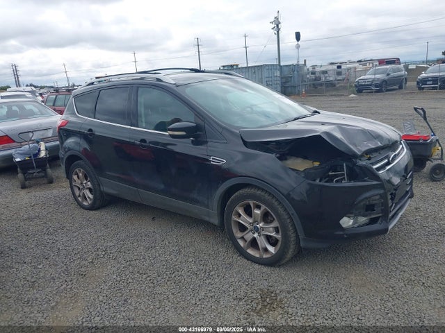 1FMCU9J99EUE49756 Ford 2014