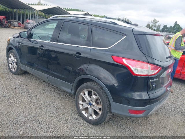 1FMCU9J99EUE49756 Ford 2014