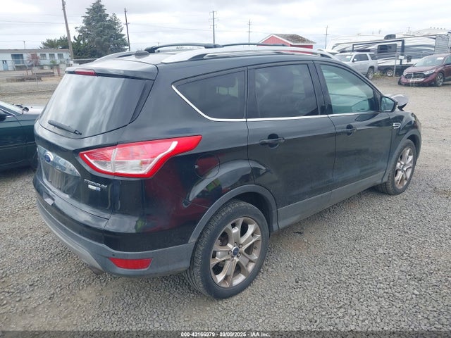 1FMCU9J99EUE49756 Ford 2014