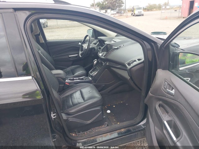 1FMCU9J99EUE49756 Ford 2014