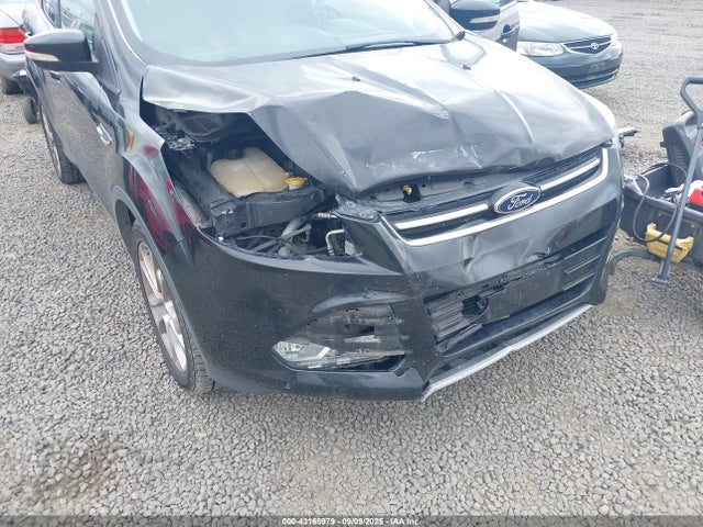1FMCU9J99EUE49756 Ford 2014
