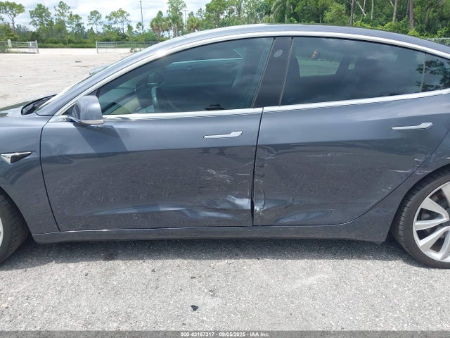 5YJ3E1EB5KF213996 Tesla 2019