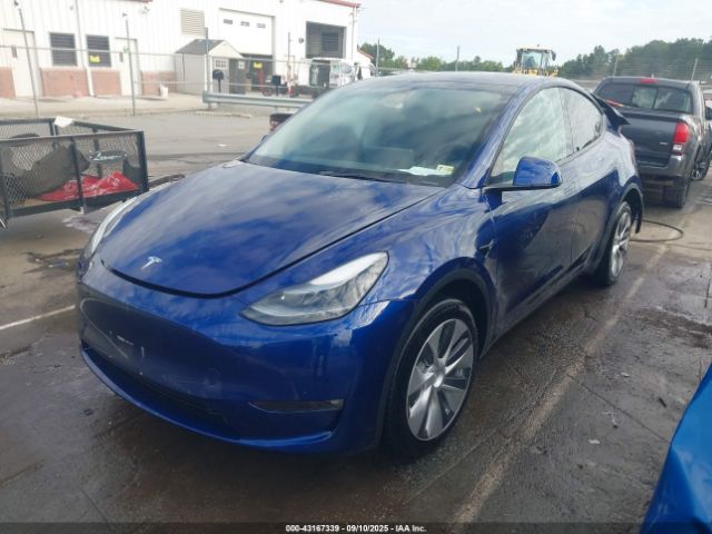 2023 TESLA MODEL Y 7SAYGDEE6PF685923 Photo 1