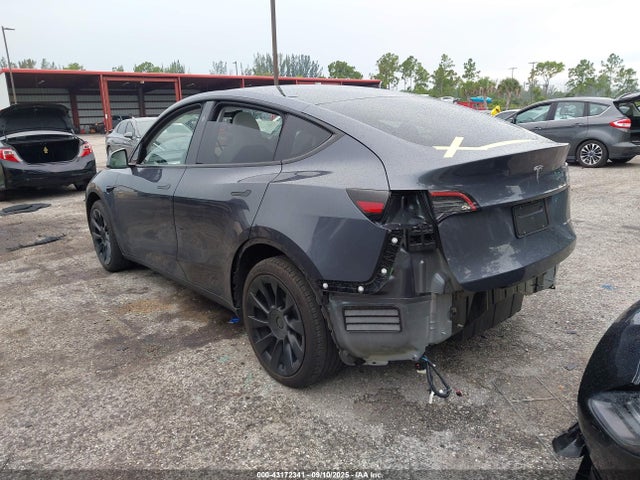 2023 TESLA MODEL Y 7SAYGDEE8PA198641 Photo 2