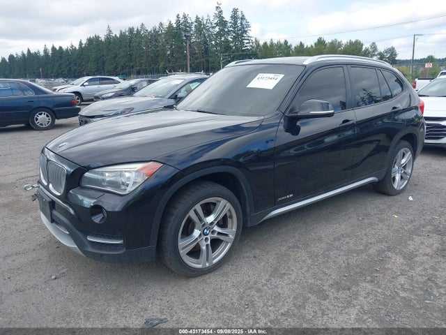 WBAVM5C54EVV92489 BMW X1