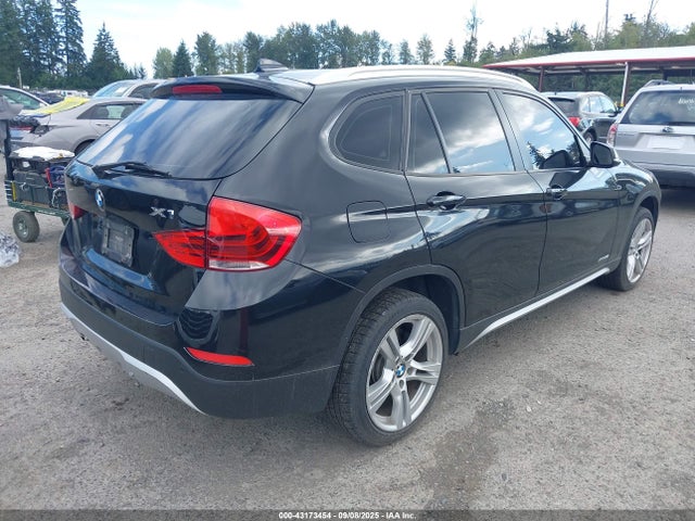 WBAVM5C54EVV92489 BMW X1