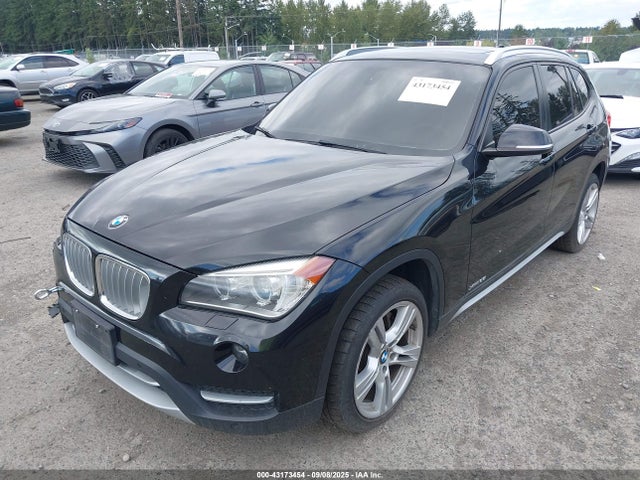 WBAVM5C54EVV92489 BMW X1