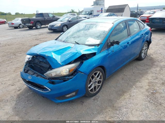 2015 FORD FOCUS 1FADP3F27FL320095 Photo 1