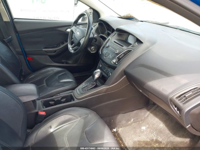 2015 FORD FOCUS 1FADP3F27FL320095 Photo 4