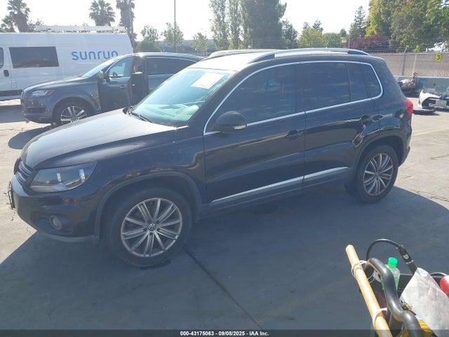 Volkswagen Tiguan 2014 WVGAV3AX0EW592406 Image 2