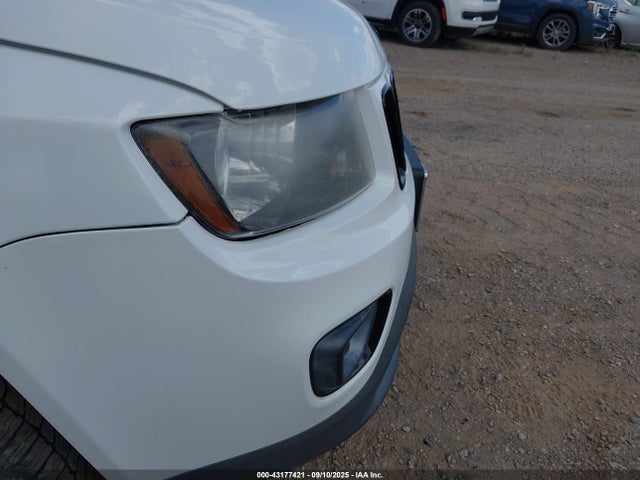 1C4NJDBB3FD259124 Jeep Compass