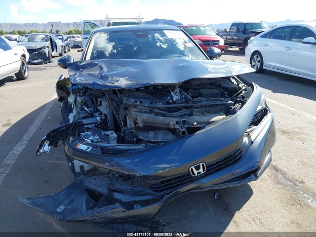 2HGFE1F74NH318178 Honda l15by