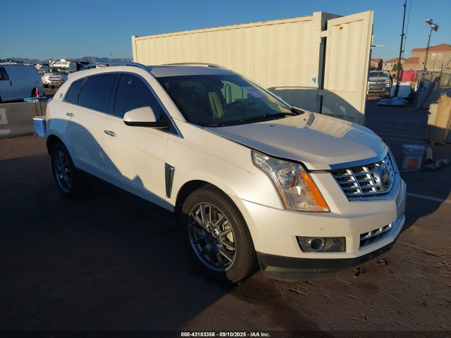2015 CADILLAC SRX 3GYFNDE35FS572604 Photo 0