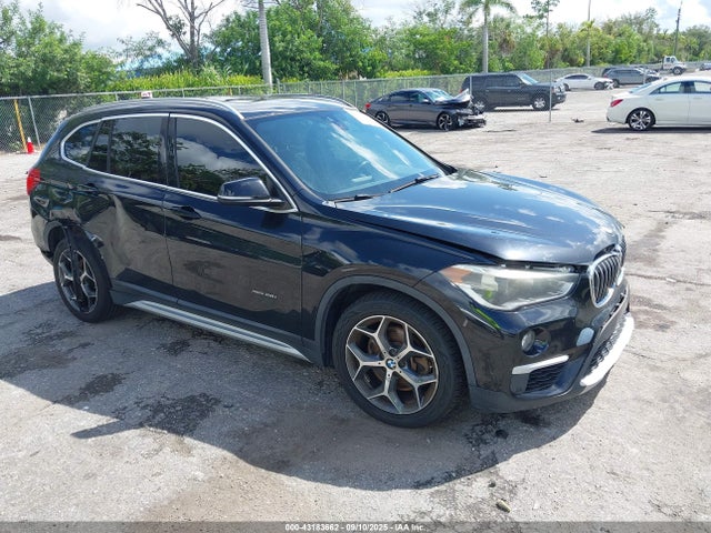 2016 BMW X1 WBXHT3C30G5E48257