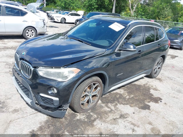2016 BMW X1 WBXHT3C30G5E48257 Photo 1
